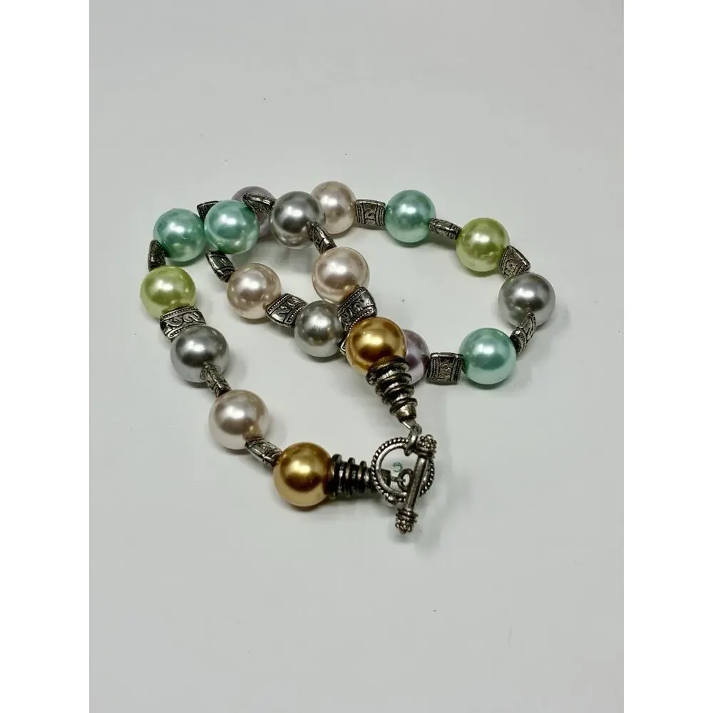 Pastel Faux pearl necklace with antiqued Silver Tone metal spacer beads.
